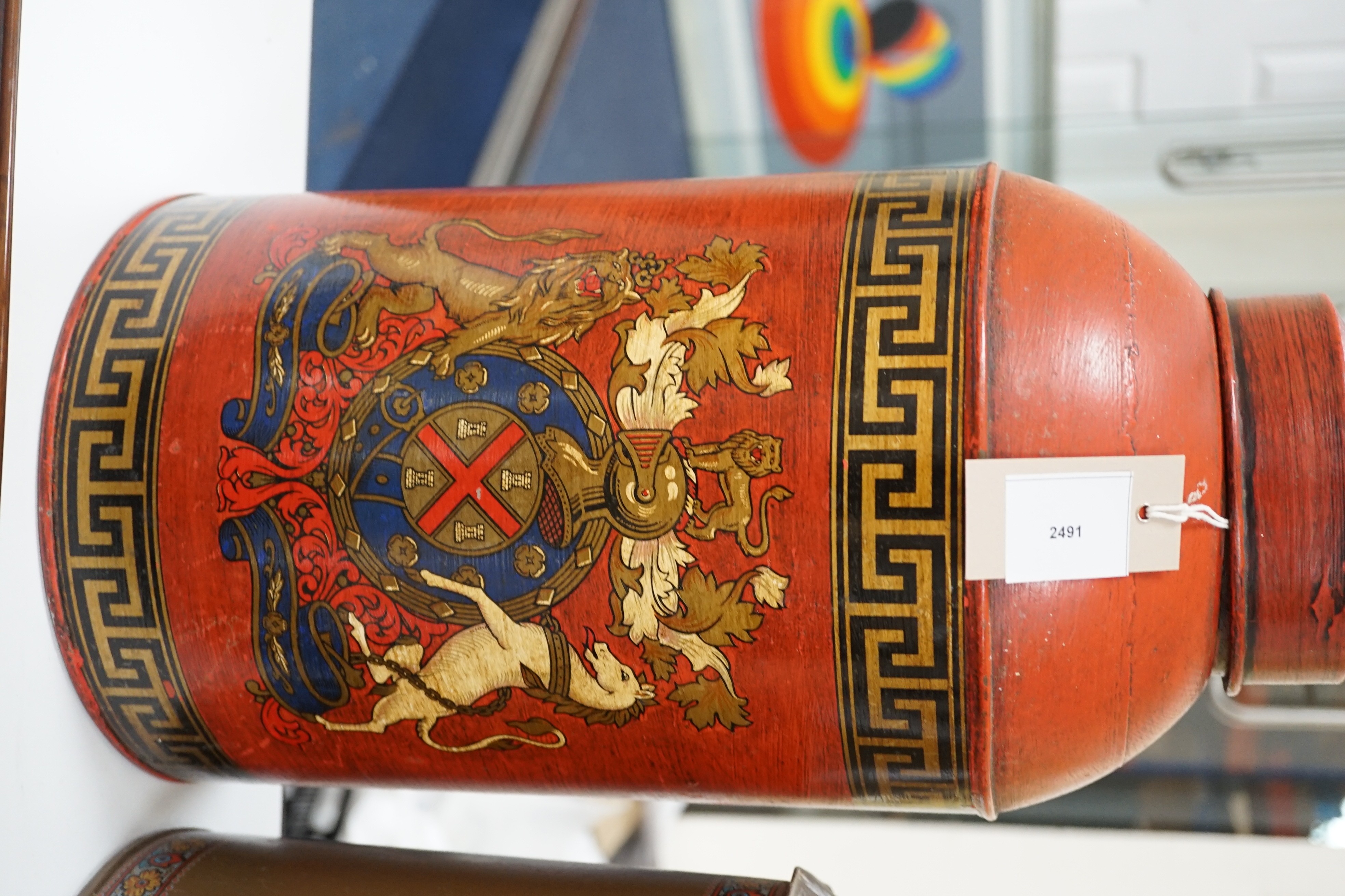 Two large toleware decorated canisters, 46 cms high